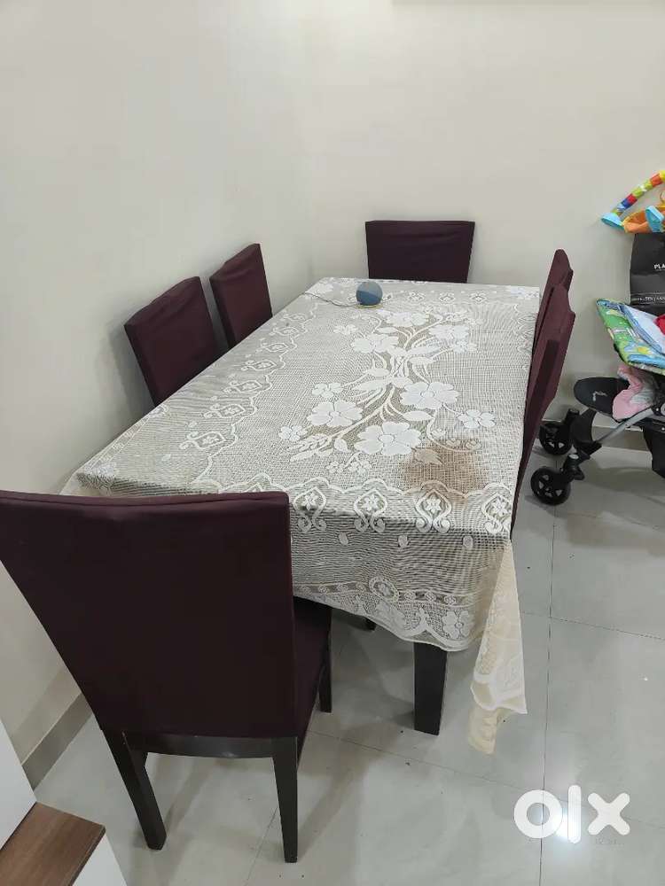 Wooden Dining table with 6 chairs