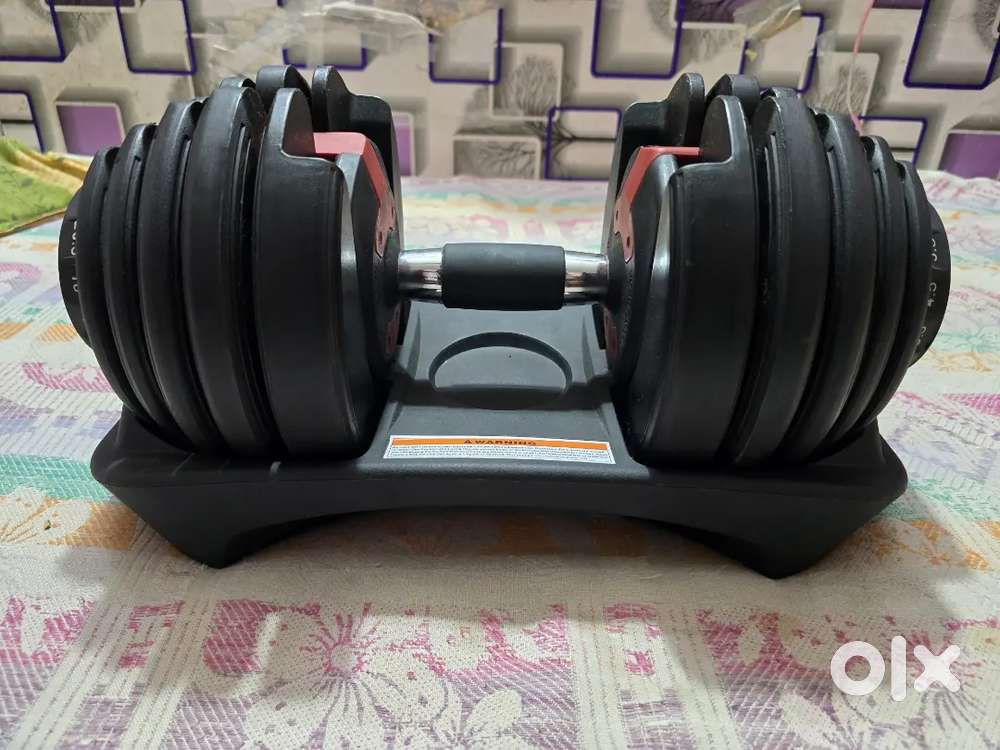 ONE PIECE  OF ADJUSTABLE DUMBELS WITH 24KG LIMIT AS NEW CONDITION SALE