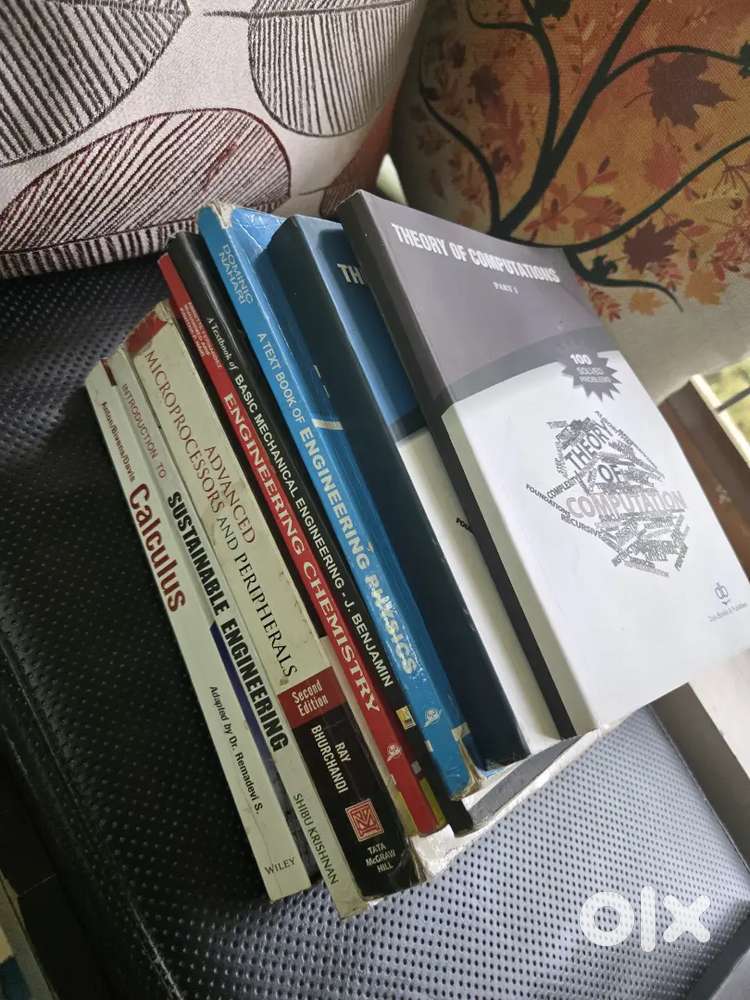 Stack of 8 computer science engineering textbooks