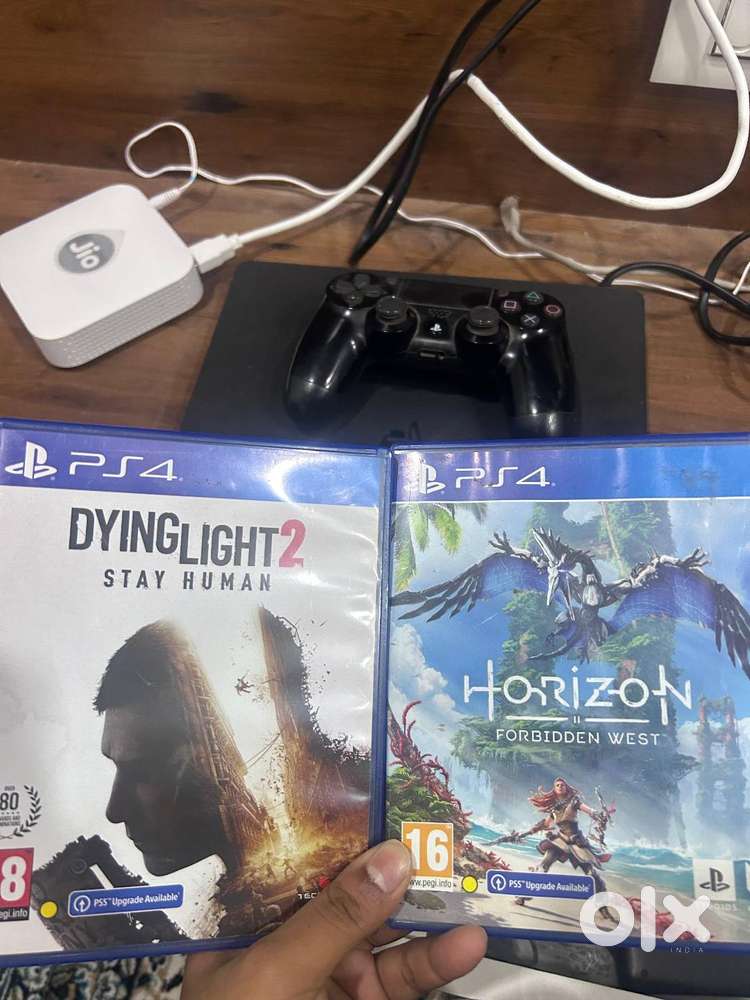 PlayStation 4 slim 500GB and 19 game disc