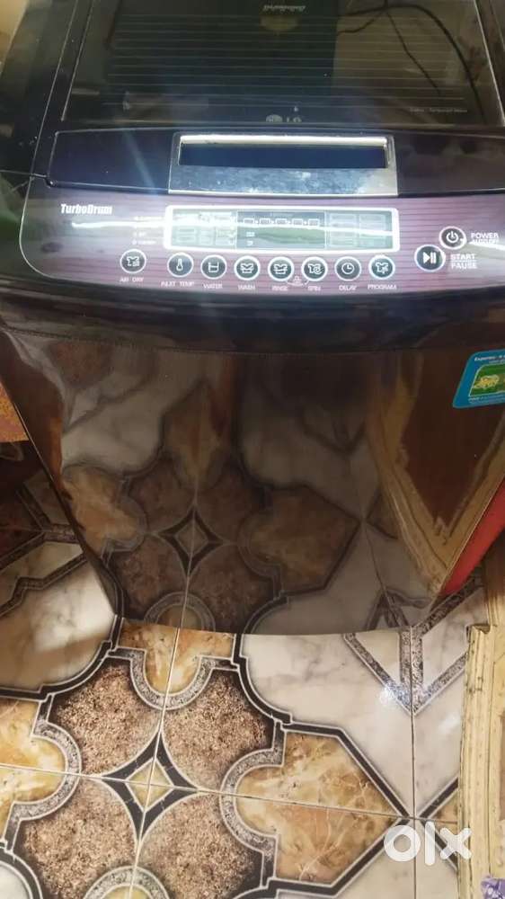 LG Full Automatic Top Load Washing Machine.
