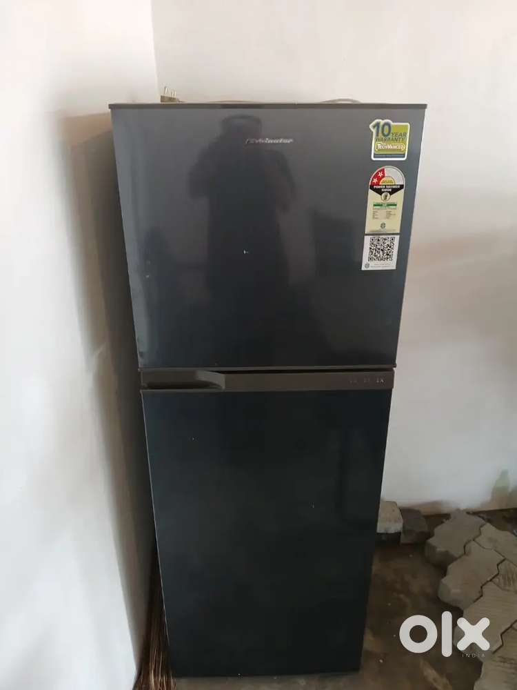 One year used double door fridge