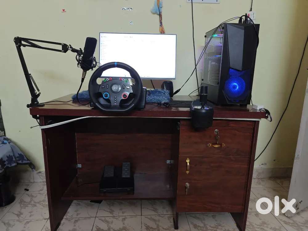 Gaming pc with moniter and stering wheel