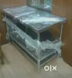 UNUSED 2 WEEK OLD STAINLESS STEEL WORKING TABLE WITH 2 UNDER SHELF