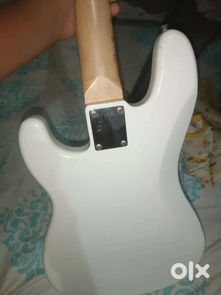 Bass Guitar And An Amplifier.