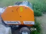 ROUND BALER