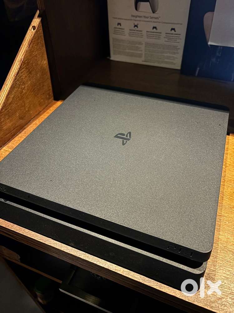 PS4 Slim 1TB with 7 Games.