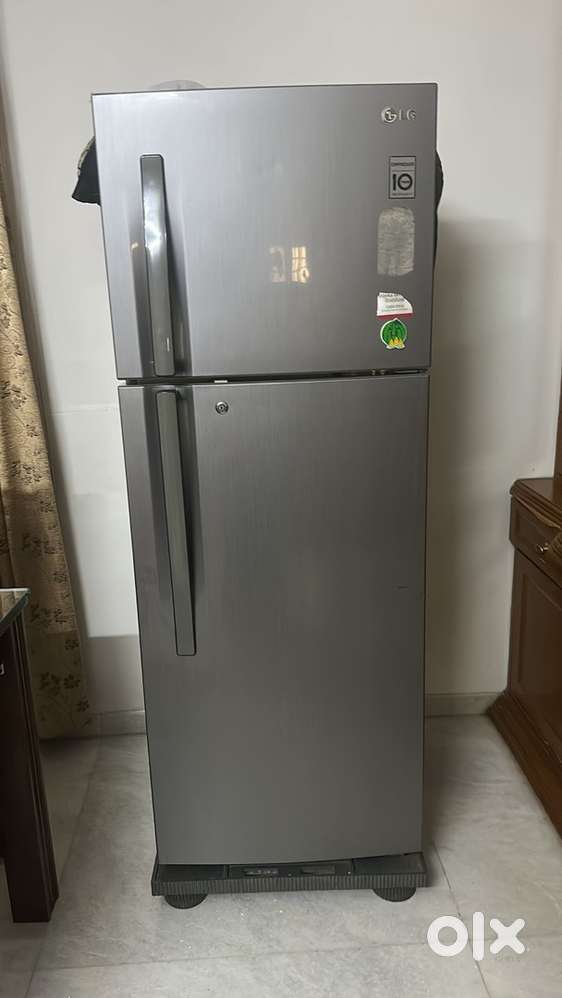 Single door with freezer . Grey in color.