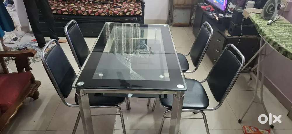 Glass top dining table with 4 chairs