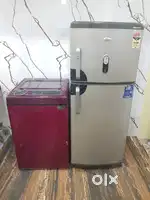 Whirlpool double door refrigerator and whripool top load washing machi