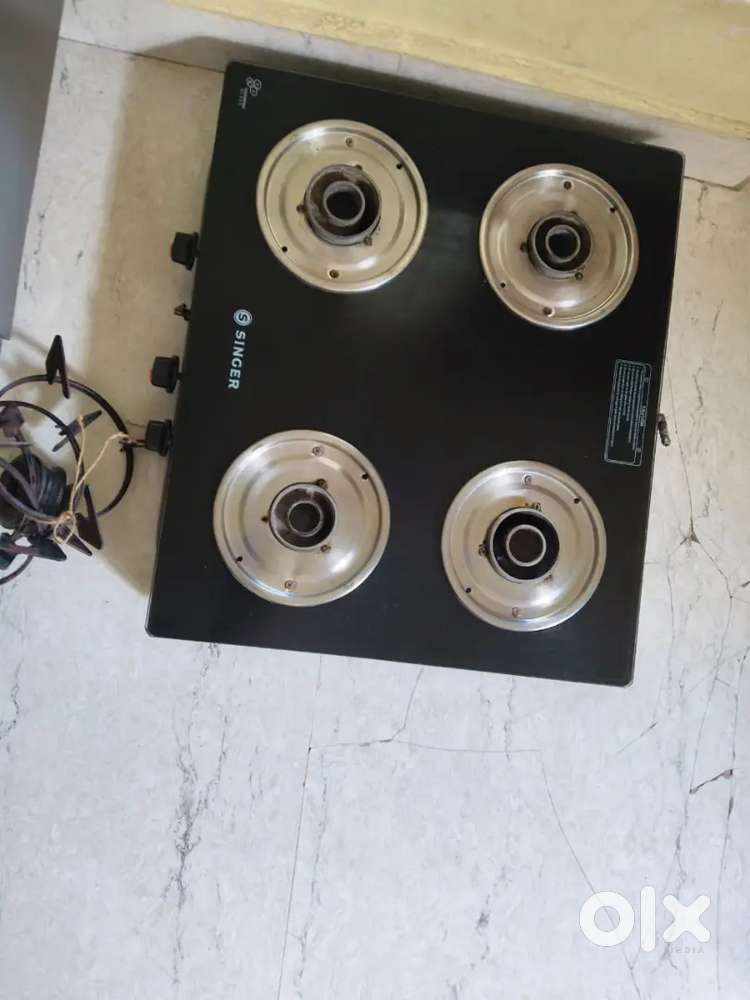 Singer gas stove four burner glass top