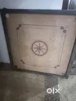 Carrom board h bilkul ok h only 4 months old h
