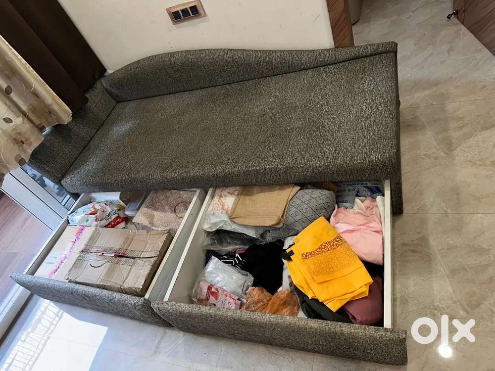 Grey Couch with ample storage - Brand New!