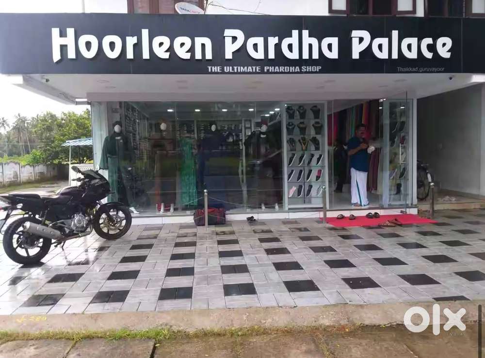 Near Guruvayoor temple , 2 car parking   800sqft Main road side area