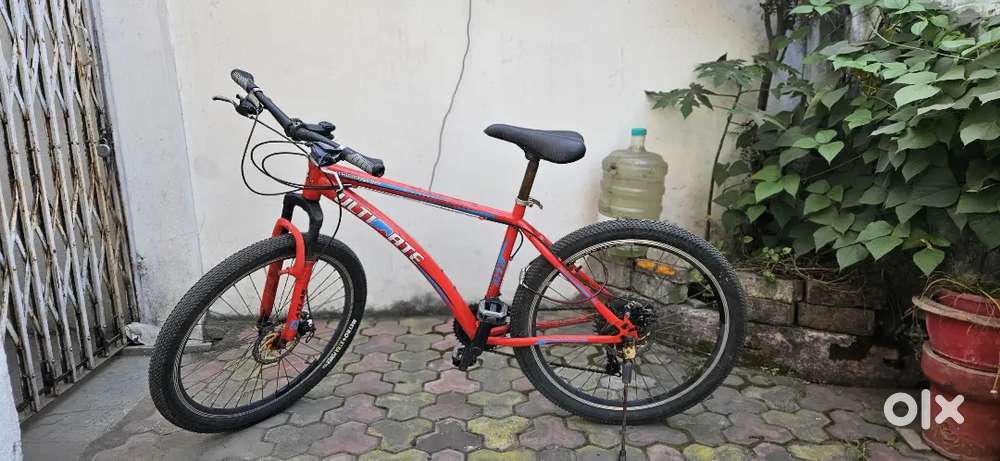 Well-Maintained Red Ultimate Gear Bicycle Smooth Ride,