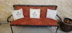 sofa set with glass table and canvas painting