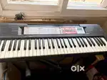 Nearly New YAMAHA PSR- F50 PORTABLE KEYBOARD with STAND