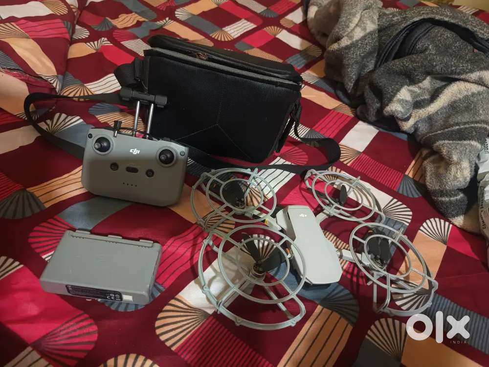 Dji mini 2 drone combo with propeller gurd and 3 battery  + charger