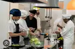 Kitchen chef and helper staff
