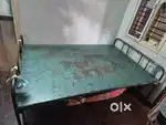 Iron cot selling with queen size mattress used