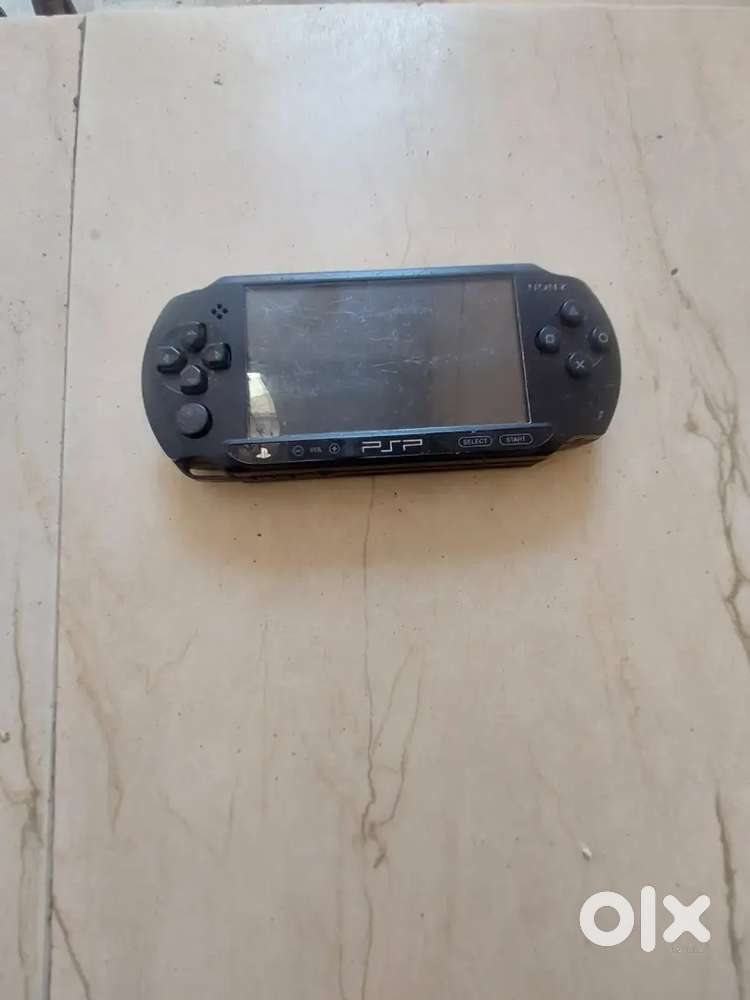 Psp e1000 street with charger and memory card