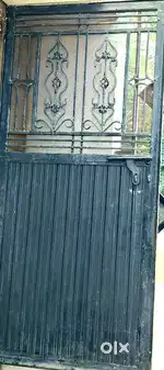 Architecturally beautiful,strong, durable iron door with framing
