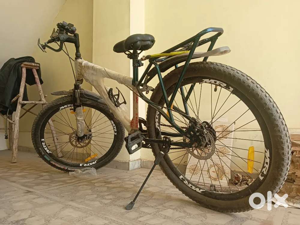 Sports Bicycle with disc breaks + shocker etc.  1 month old,