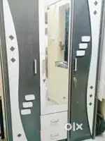 Stylish Double Door Almirah –  Black & White Finish, Great Condition!