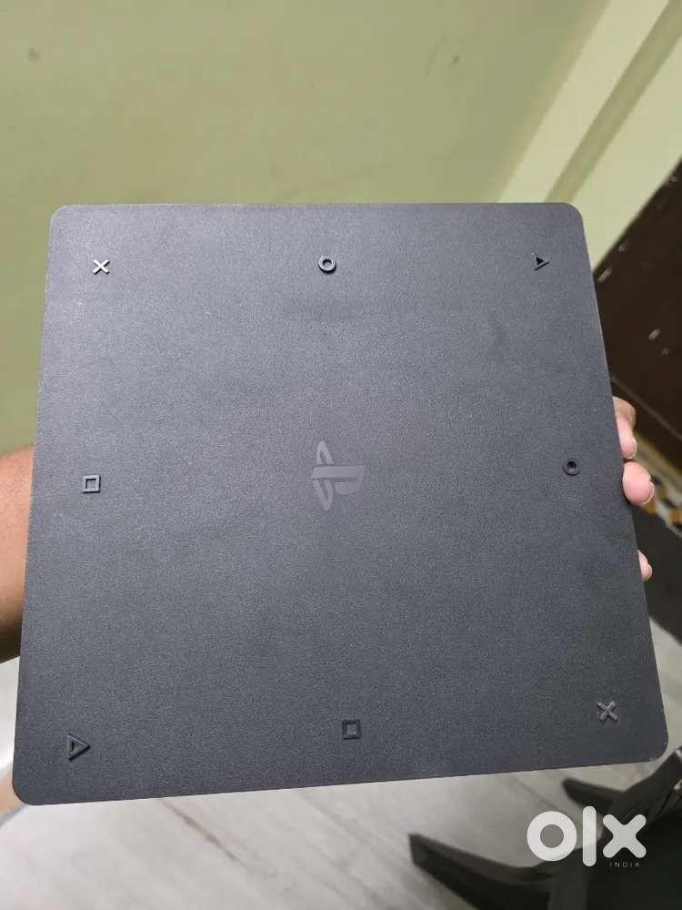 PS4 SLIM 1 TB with 2 controllers & games collection