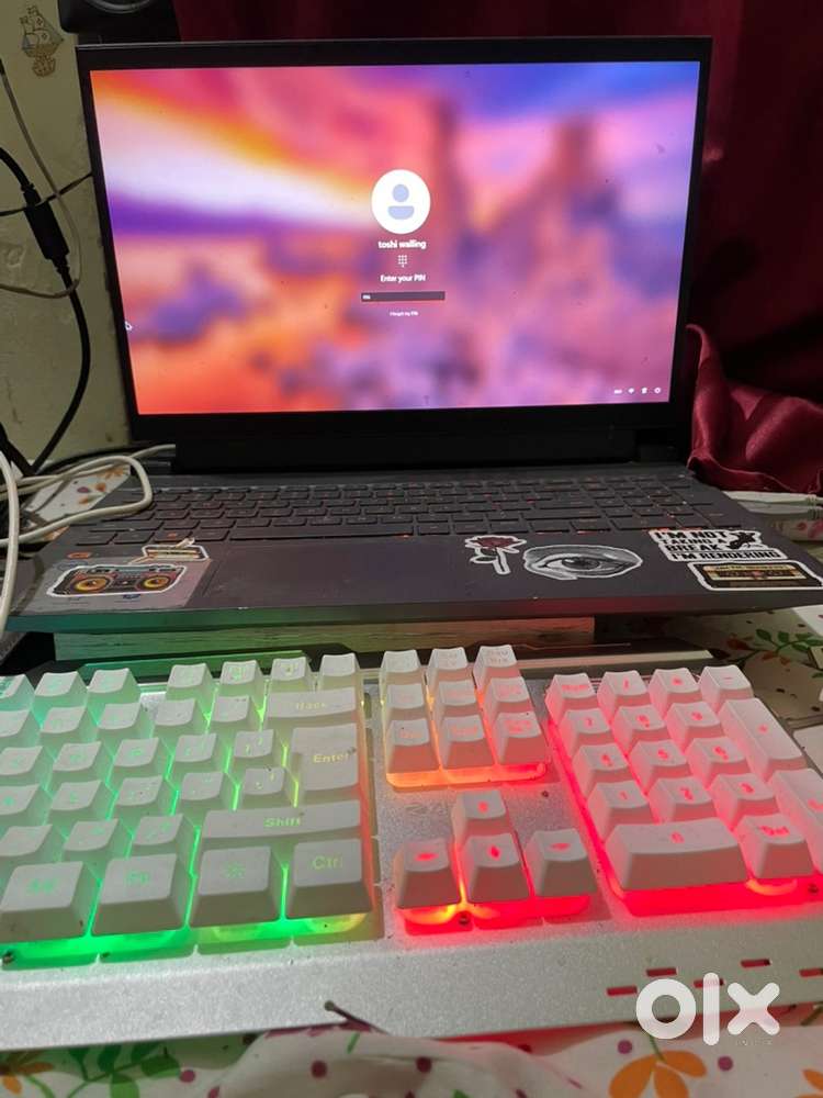 Dell G-15 gaming laptop with RGB mouse and keyboard