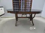 Dining table of teak wood