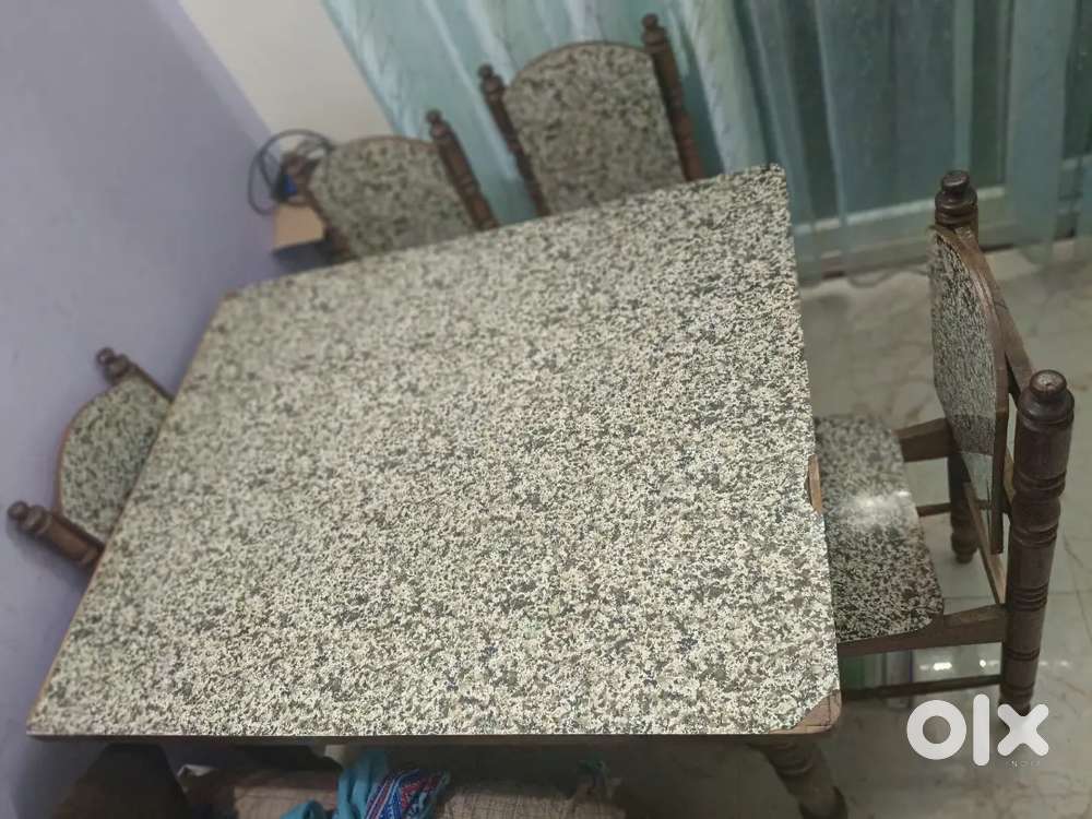 Used Teak wood Dinning Table with four chairs