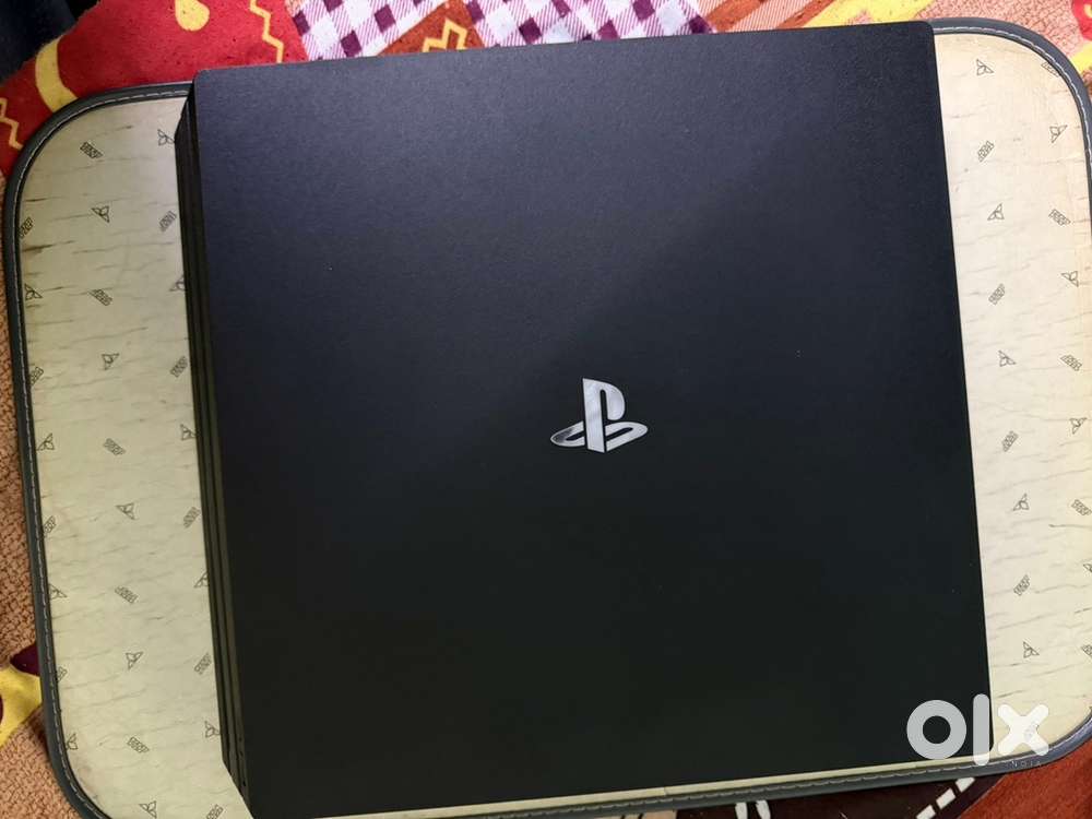 Pristine PS4 Pro 1TB - Unbeatable Gaming Experience