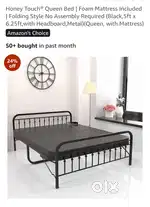Folding double bed with foam mattress.