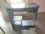 Two table and two chairs and 1 folding bed