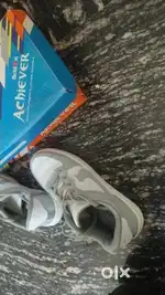 1. “White Action Achiever Shoes – Size 9, Only ₹700!”