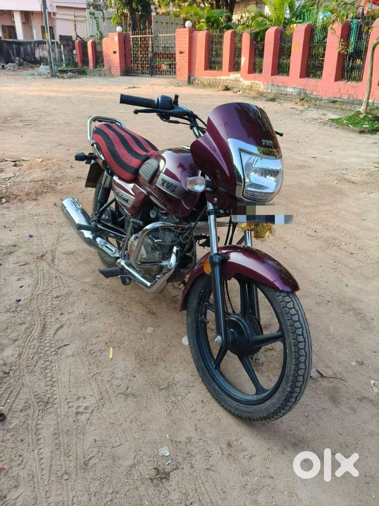 TVS Radeon motorcycle new condition very less driven