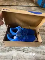 Brand new Original Asics shoe for sale ideal for 8-9 size