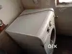 Ifb front load washing machine 7 kg  16 years old condition Good