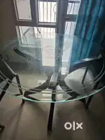 4 seater round Dining table with glass top and wooden base