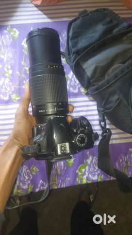 Dslr nikon d3200 with zoom lens