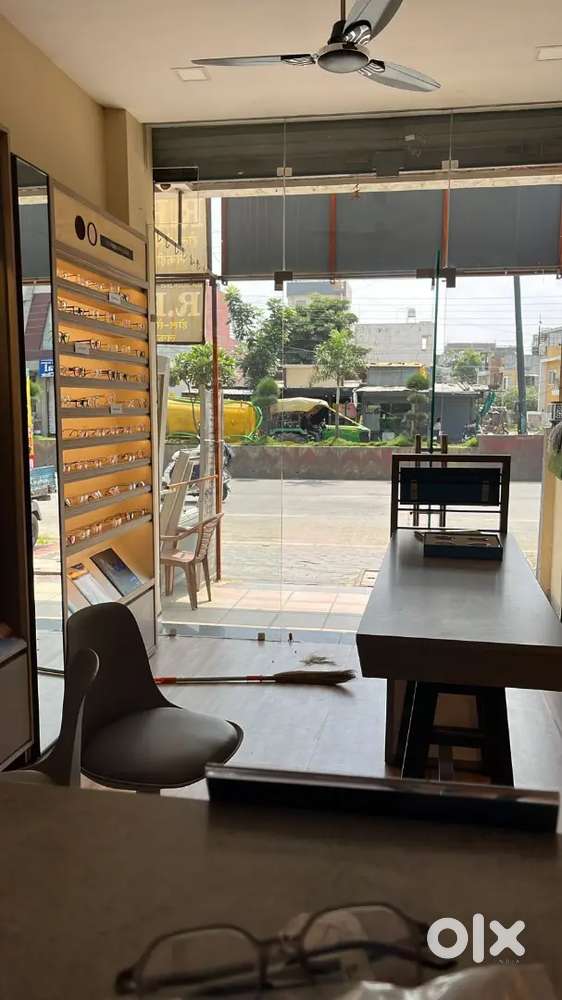 Running optical store for sale