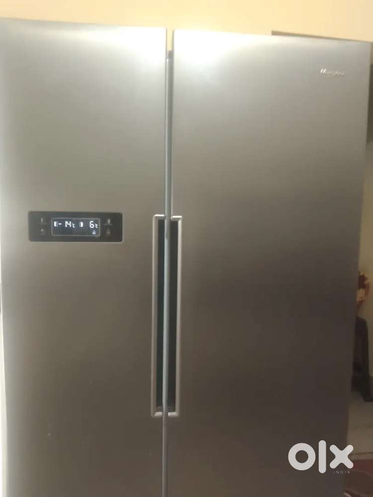 Double door whirlpool fridge 1.5 year old new condition shift prblm