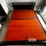 Selling solid wood Kingsize bed with storage