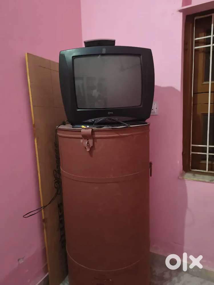TV with storage drum