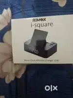 Alarm clock with wireless charger