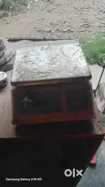 Electronic weighting machine