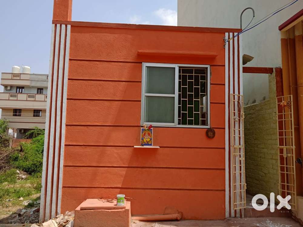 Single room with fan light installed common toilet sheet roof