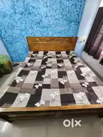 Upgrade your sleep with premium wooden Bed with Mattress.