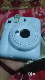 Camera with inbuilt printer